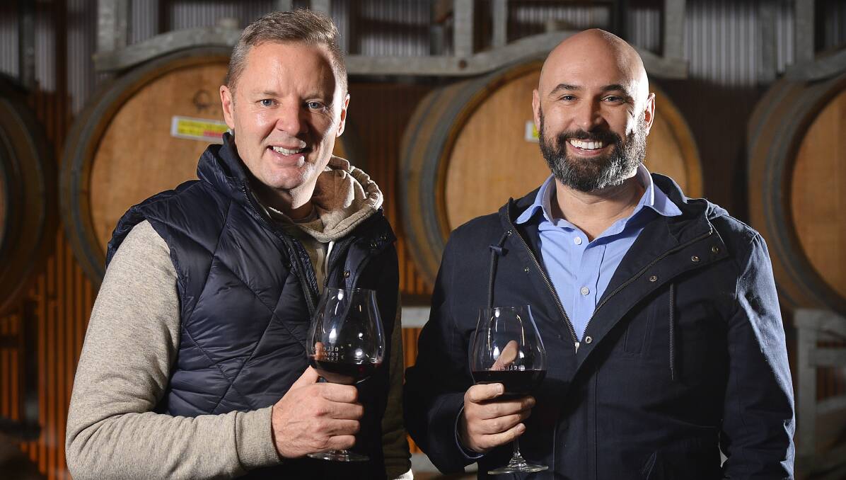 Big dreams: ​​Lee Milne and Simon Mallia have ditched their corporate past as bankers in a bid for an idyllic life among the vines. Picture: Dylan Burns