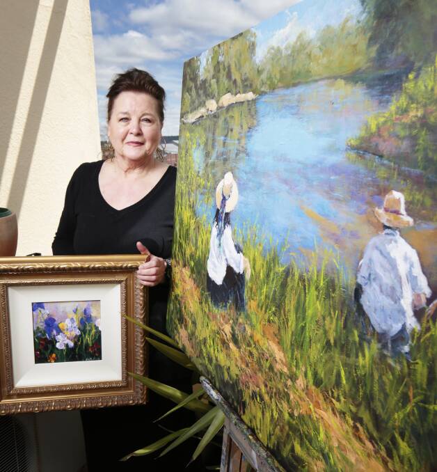 Scenic: Daylesford artist Roberta Donnelly with some of her works, which will be for sale at the annual upcoming Daylesford Art Show at the Town Hall. Picture: Luka Kauzlaric
