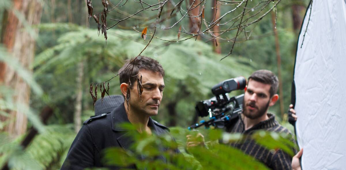 Daylesford's dark side: Actor Jay Bardon and cinematographer Joshua Nicol shoot scenes from the upcoming thriller film Iniquitous. Picture: Raphael Chan