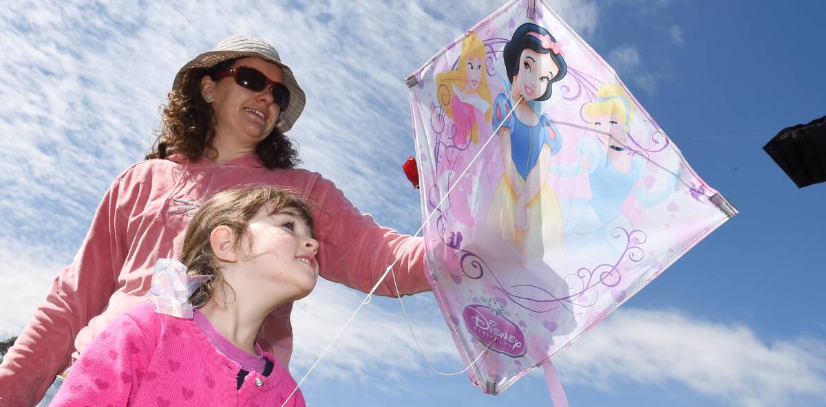 Up in the air: Deanne Labbett and Anastasia Georgiades plan to get Snow White airborne at the Dean Kite Festival, which will be held September 4. Picture: Lachlan Bence