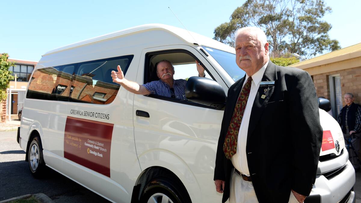 NEW BUS: Creswick Senior Citizens Club president Bryan Reasons and chairman of the Creswick and District Community Bank Graeme Mitchell. Picture: Dylan Burns.