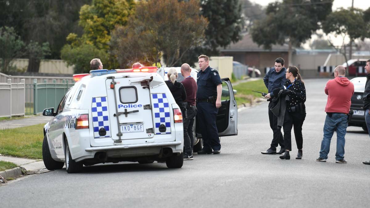 Police officers arrest the boy along Willow Grove at Wendouree on Tuesday afternoon. Picture: Kate Healy 