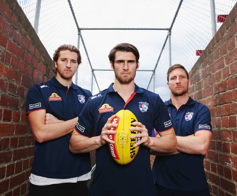 READY: Western Bulldogs young star Marcus Bontempelli, stand-in captain Easton Wood and spiritual leader Matthew Boyd are set to lead the club's AFL flag bid, wearing Ballarat branding on their uniforms. Picture: Getty Images