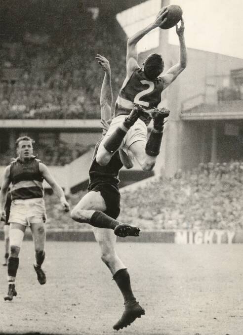 Merv Hobbs' iconic, high flying mark in the 1961 preliminary final
