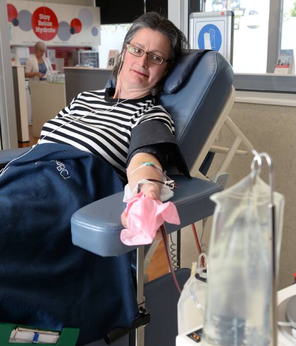 DONATION: Nardia Keene giving blood yesterday at the Ballarat Blood Donor Centre, in response to the service's call for donations over the Melbourne Cup weekend. Picture: Kate Healy.