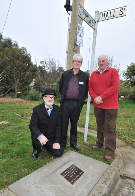 HONOUR: At the new plaque in Creswick to honour former Australian PM John Curtin are, from left, David Barclay and Hepburn councillors Don Henderson and Greg May.