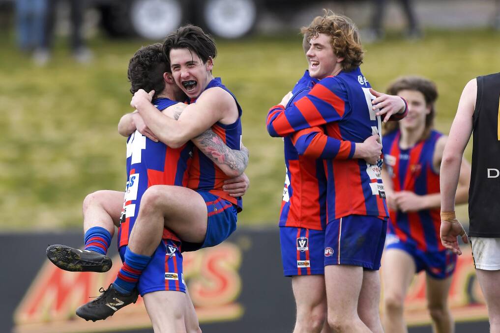 ELATION: Hepburn's Bryce Coffey and Hayden Rodgers celebrate their premiership win in the 2017 CHFL U/18s grand final match against Springbank.