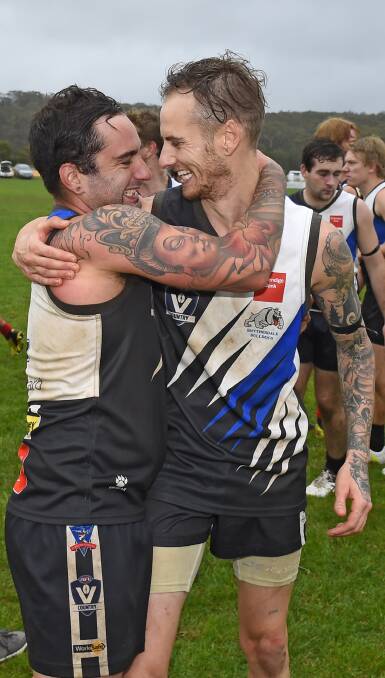 HUGS ALL ROUND: Smythesdale celebrates its first victory in five years in the Central Highlands Football League after a win against Skipton. Picture: Luka Kauzlaric