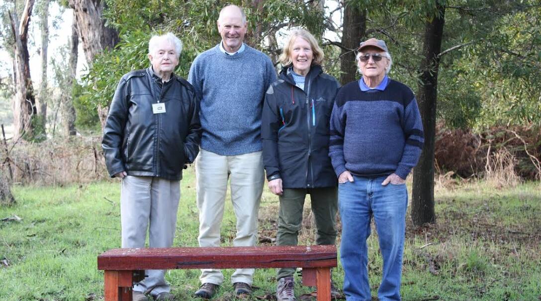 COMMUNITY-MINDED: Don Killeen, Ken Ferguson, John Cable and Margret Lockwood with one of the new seats made by the Daylesford Men's Shed.