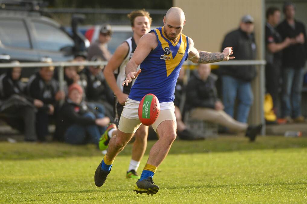 EYE ON THE BALL: Scott Whiting of the Learmonth Lakies kicks the ball during the 2017 CHFL round six match against Clunes Magpies on Saturday. Picture: Dylan Burns