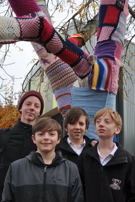 A different take on art: Daylesford Secondary College Year 10 student Alfie Pleasance with Year Seven students Jordan Ballinger, Alex Rodgers and Rufus Pleasance.  Picture:Jodie Goldring. 