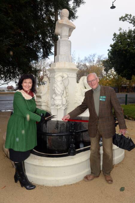 Unveiled: City of Ballarat mayor Samantha McIntosh and Friends of the Ballarat Botanical Gardens president Raoul Dixom cut the ribbon at the Claxton Fountain.  Picture: Kate Healy. 