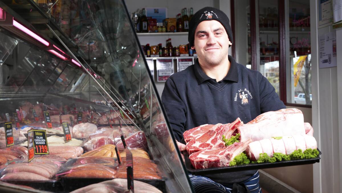 Jimmy Nevill at the Albert Street Butchery.  Picture: Luka Kauzlaric. 