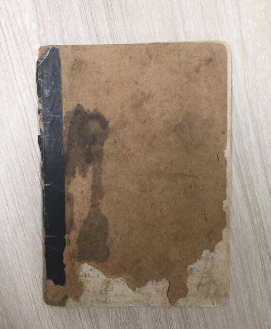 A dangerous practice: the cover of Tom Murphy's wartime diary. Some of the early pages are damaged and illegible. Picture: Caleb Cluff.