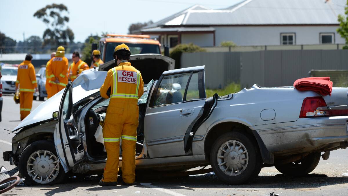 Accident: CFA members at the scene of an accident in Sebastopol. Picture: Kate Healy.