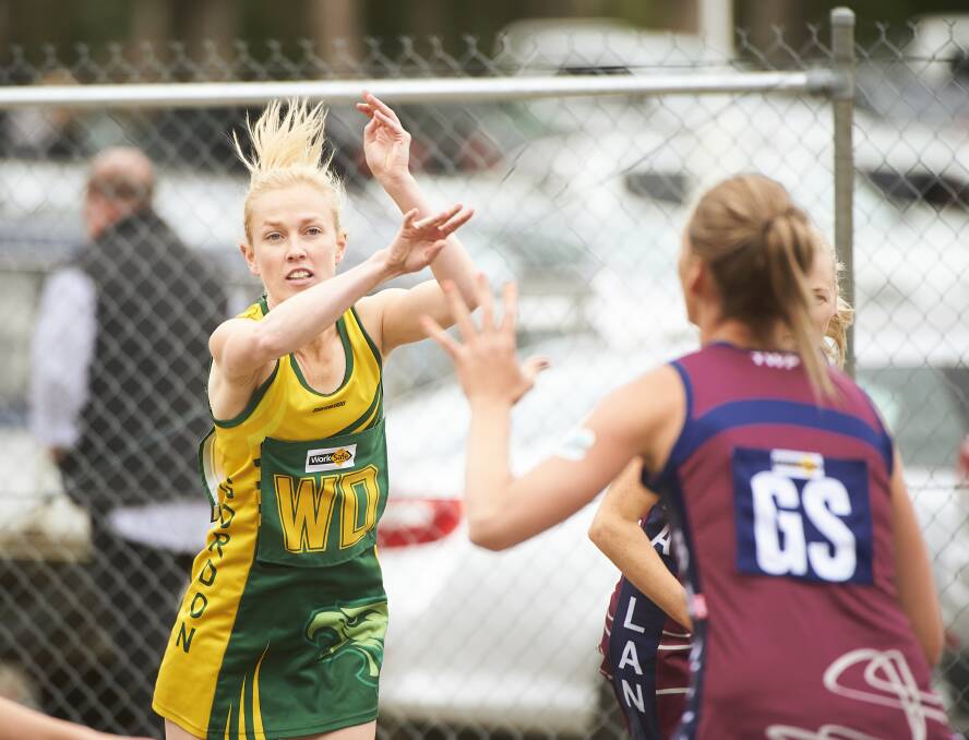 MID-COURT BALL: Gordon's Samantha Torry spots up an option in her Central Highlands Netball League A grade clash with Ballan. Picture: Luka Kauzlaric