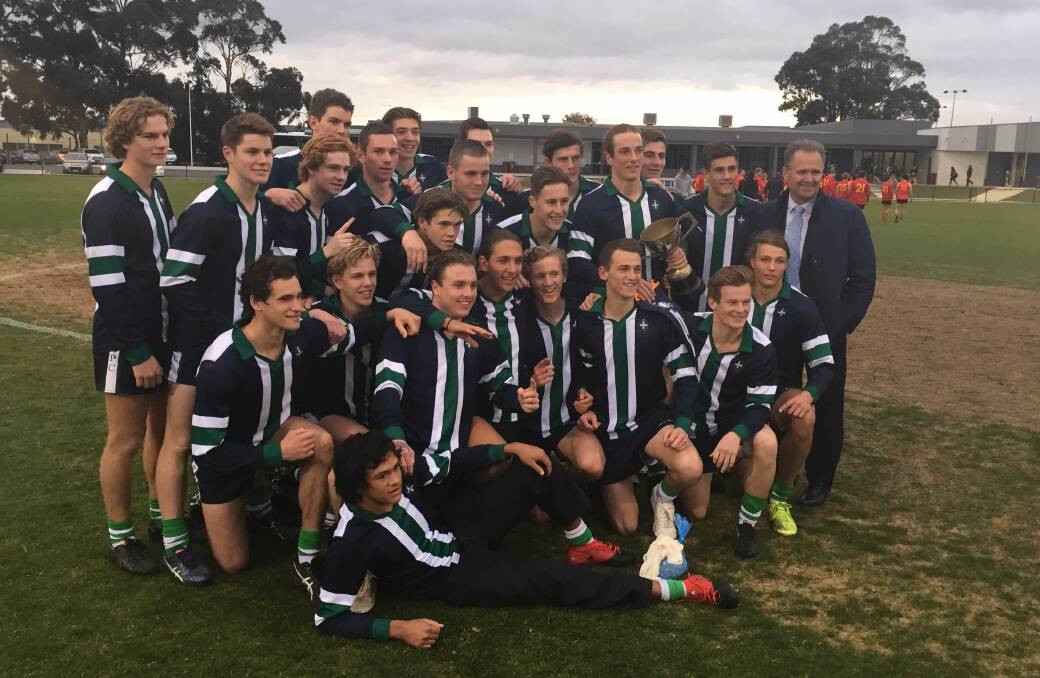 DOMINANT: St Patrick's College celebrates its huge 101-point win in the Ballarat Associated Schools grand final.