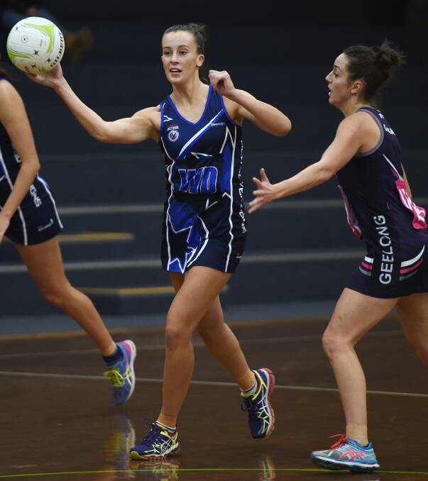 Sovereigns' Casey Adamson gets her pass off against Geelong Cougars in one of the club's two home matches in the 2016 VNL season.