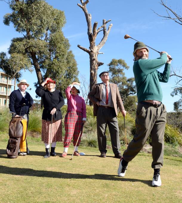 WINDING BACK THE CLOCK: Paul McGuiness, Adriana Cunnington, Rhonnie Dryne, Brian Anstey and Jeff Green get in the spirit of Creswick's centenary celebrations.
