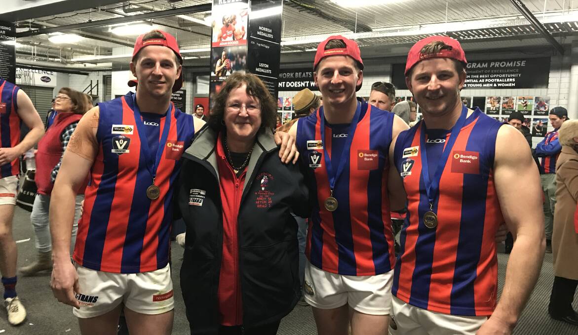 FAMILY: Jill McKay with her sons Brad, Mitch and Andy after Saturday's Central Highlands Football League grand final. Picture: Tim O'Connor.