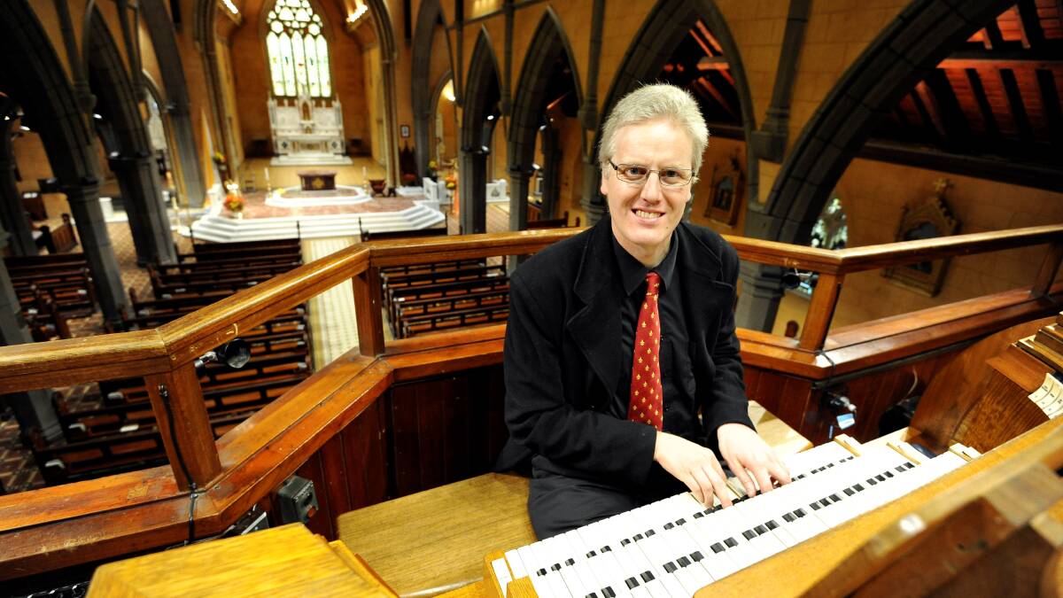 United in song: Christ Church Cathedral organist Leigh Askew will perform at Sunday's choir festival. Picture: Lachlan Bence. 