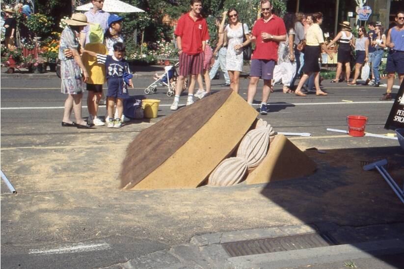 CHALLENGES: ‘A piece of cake’, sand work in the street for the Melbourne Food and Wine Festival. Petrus Spronk says art encourages people to look at things in new ways. 