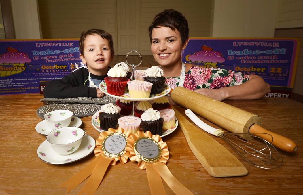 SWEET TOOTH: Lenny Fuller, 3, and his mother Dorothy Fuller prepare for the Lyonville Bake Off. Funds raised from the event on Sunday will go towards maintenance and upkeep of the historic community hall. Picture: Dylan Burns. 