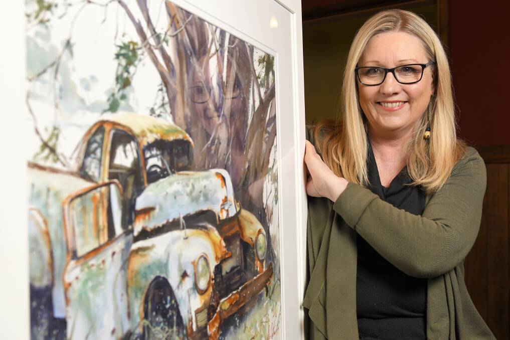 PUB ART: Helen Cottle's exhibition of "Rural Love" at The Cosmopolitan Hotel allows visitors to experience her art in a comfortable and relaxed space. Picture: Dylan Burns. 