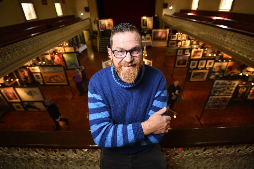 ART SHOW: Artist Phillip Edwards won best landscape for his piece July Budding: Mt Buffalo at the Daylesford Art Show. The exhibition was held at the Daylesford Town Hall over the weekend. Picture: Dylan Burns. 