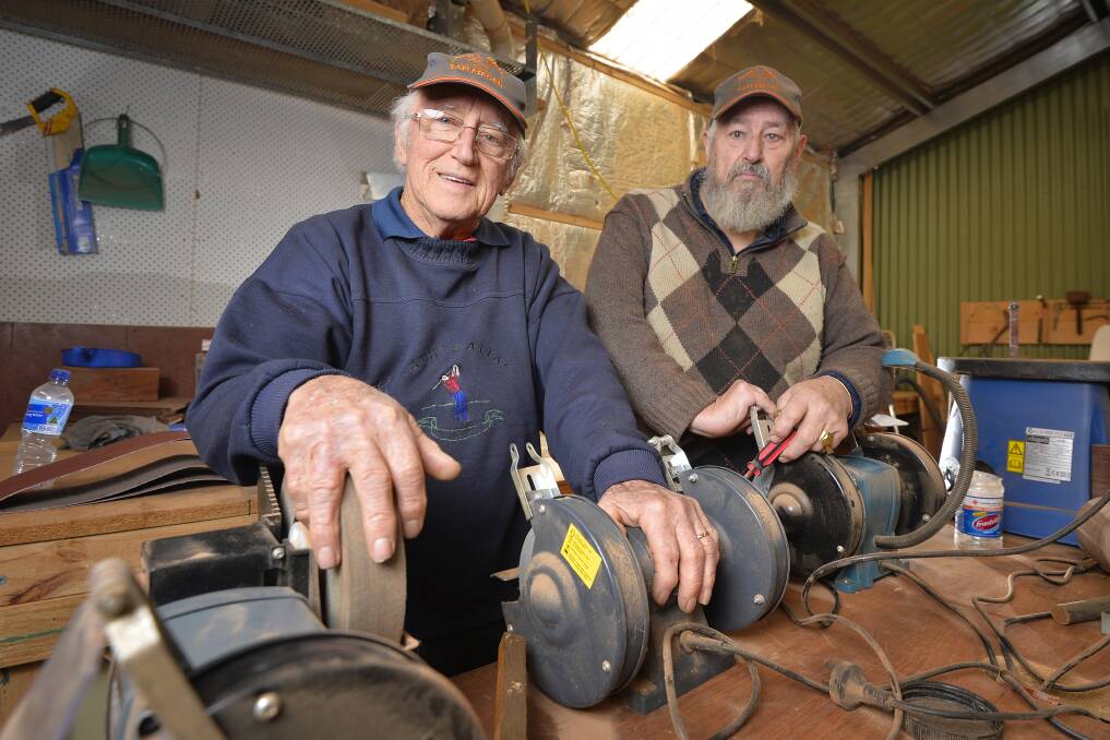 A PLACE TO CHAT: Daylesford Men's Shed members Ken Ferguson and John Wolfs say getting involved, making connections and having a place to talk has changed their life for the better. Picture: Dylan Burns. 