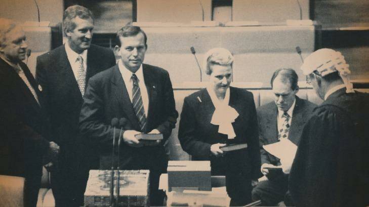 Bronwyn Bishop is sworn in at the House of Representatives, alongside Tony Abbott, in 1994. Photo: Mike Bowers
