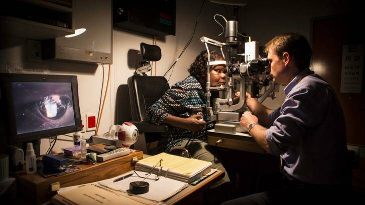 An Indigenous woman has her eyes examined at Alice Springs Base Hospital. Photo: Glenn Campbell
