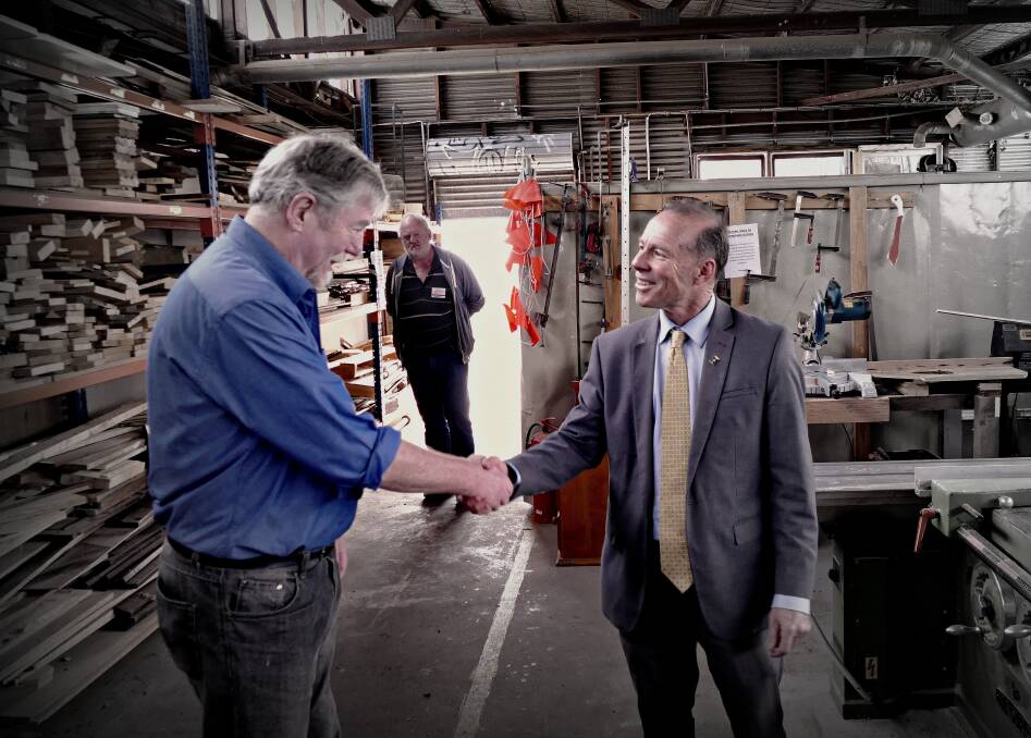 DONE DEAL: Sebastopol Men’s Shed president Les Shimmin and Member for Buninyong Geoff Howard shake hands. Picture: Supplied 
