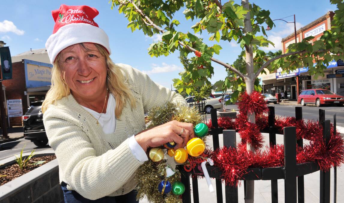 Sue Waters and a band of volunteers will be decorating Vincent Street with Christmas decorations.
Picture: JULIE HOUGH