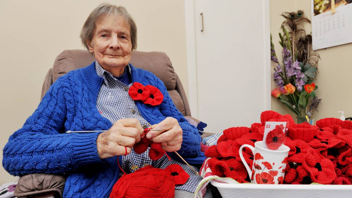 92 year old Nell Chidley is busy knitting poppies for the upcoming Anzac 100 year Anzac commemorations. Picture: JULIE HOUGH 