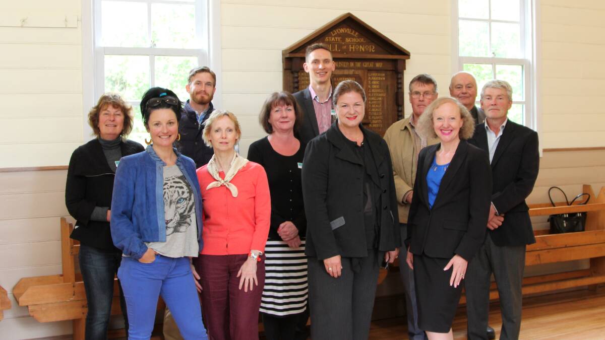 Hepburn Shire councillors Kate Redwood and Sebastian Klein (back left), with Liberal candidate for Macedon Donna Petrovich and Member for Northern Victoria Amanda Miller (front right), along with members of the Lyonville Hall Committee and Hepburn Shire staff members. 