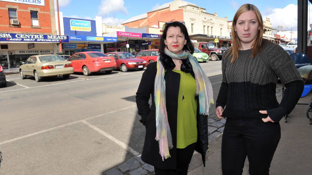 Double C Jeanery's Bronwyn Baker and Debbie Moses proprietor of 'Debbie Moses' fashion store are concerned with the proposed introduction of paid parking in the CBD. 