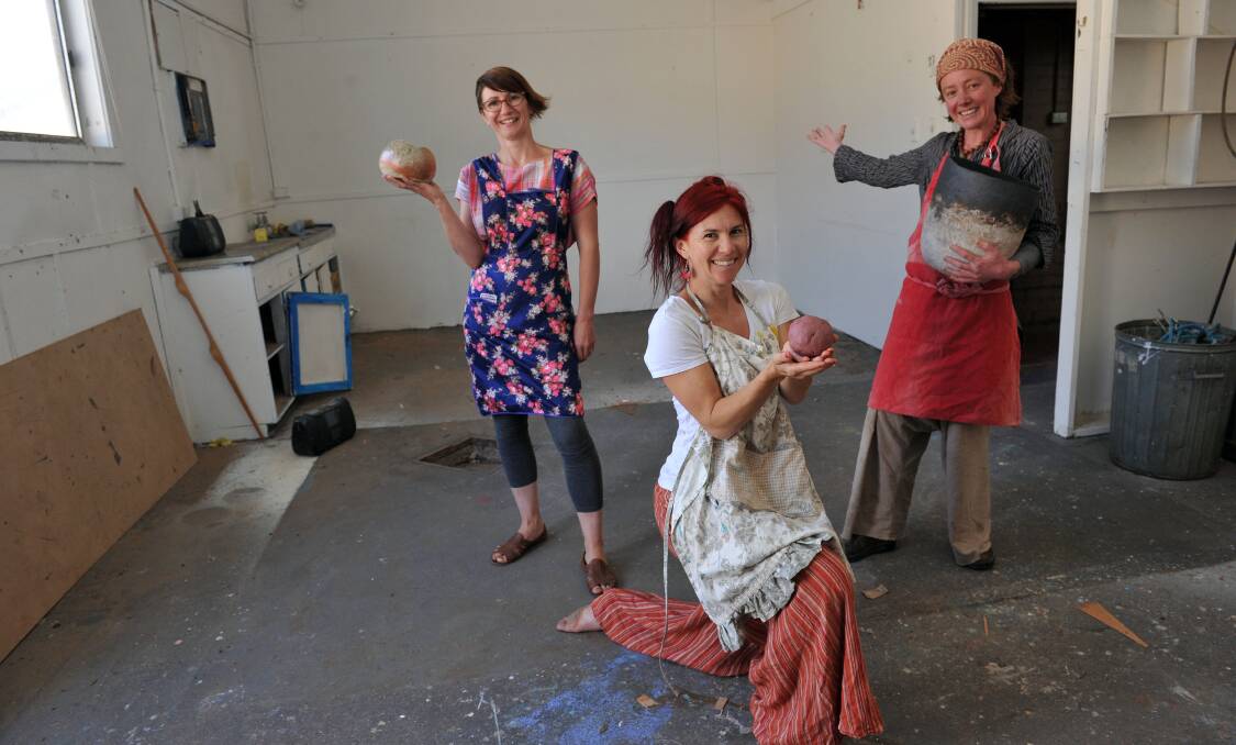 Tania Verdez and Kath Wratten are joined by Kerry Carmon (at front) in the space that will be renovated.