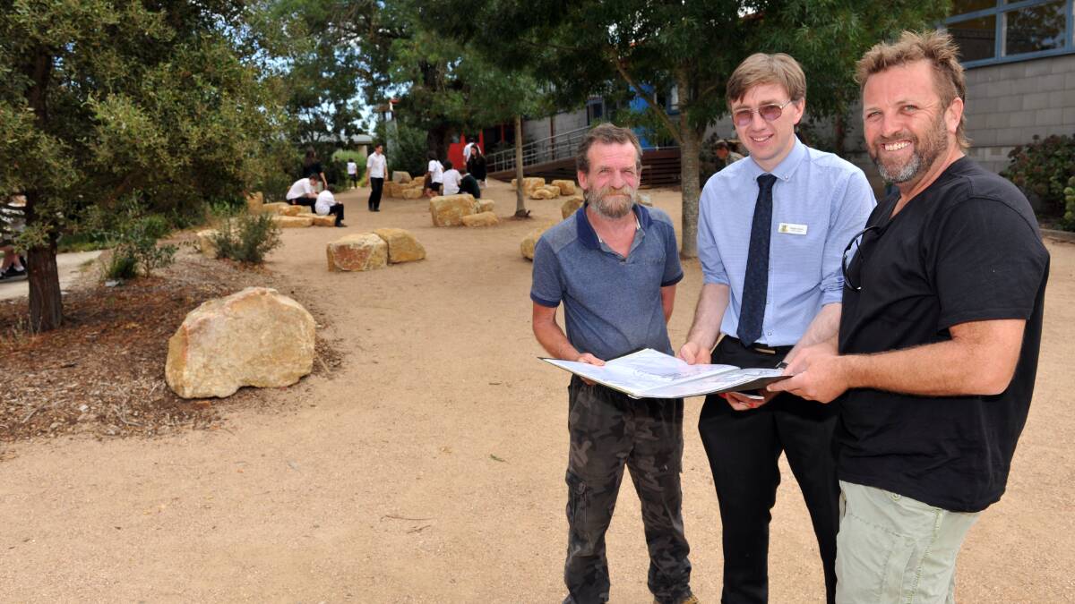 Daylesford Secondary College beautification program project co-ordinators Brendan O'Conal (construction) and 
Marcus Swetnam (designer/construction) discuss the project with Daylesford Secondary College assistant Principal Roger Dunn (centre).
Picture: JULIE HOUGH 