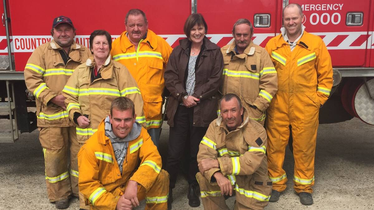 HAND UP: Macedon MP Mary-Anne Thomas with members of the Trentham CFA fire brigade. Picture: CONTRIBUTED  
