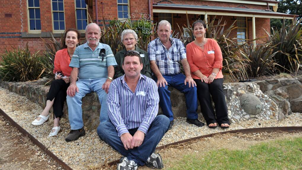 5 generations of the Olver family have attended the school. Charlie (2nd from left) his sister Beryl (centre) his son Dennis (2nd from R) daughters Cheryl (L)  Gail (R) and grandson Terry (at front).
Charlie's father Frank also attended the school along with his parents Richard and Rose Olver.

Picture: JULIE HOUGH 

