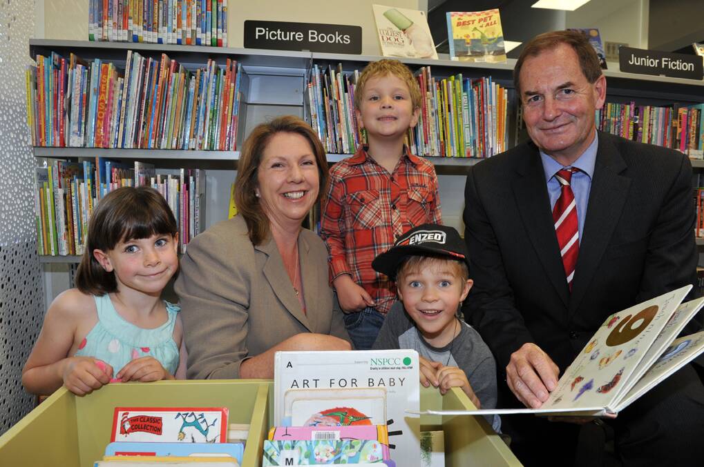 Catherine King MPand Simon Ramsey MP with children Lizzy and Charlie Day and Ryan Karlovic (front) in the children's section of the new library.


Picture: JULIE HOUGH
