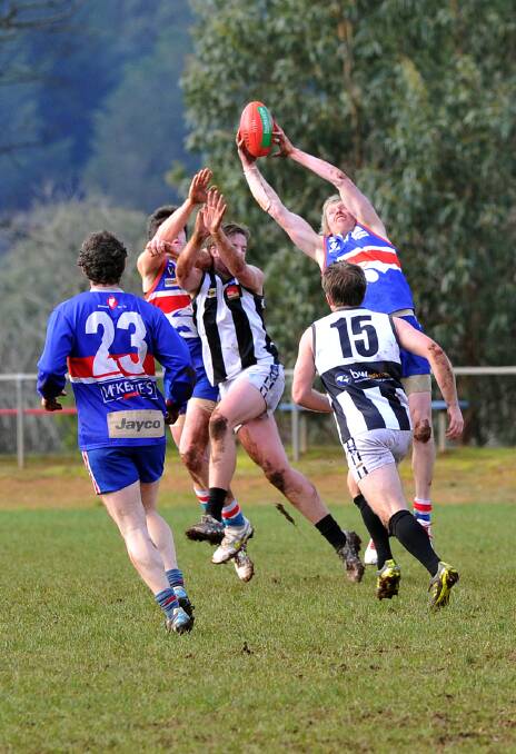 GOOD GRAB: Daylesford’s Trent Nesbitt takes a strong mark against Clunes.

Picture: JULIE HOUGH