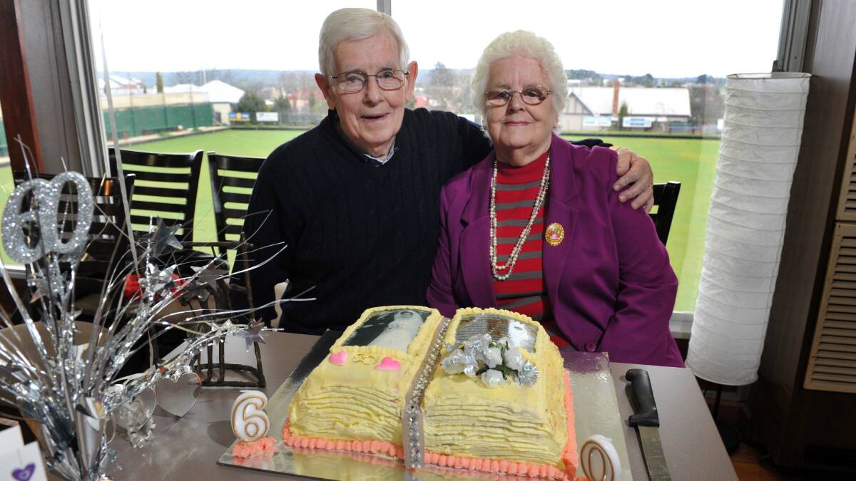 DOUBLE CELEBRATION:  Joan and Harry Rowe celebrate their 60th wedding anniversary and Joan’s 80th birthday at the Daylesford Bowling Club. Picture: Julie Hough
