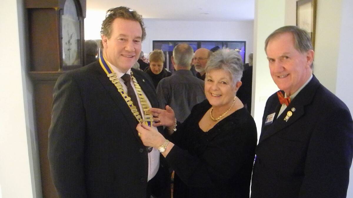 CONGRATULATIONS: Smiles all round at Daylesford Rotary Club’s change-over dinner from new president Greg Thompson, out-going president Jan Pengilley and incoming district governor Murray Verso.  Picture: JULIE ATKINS