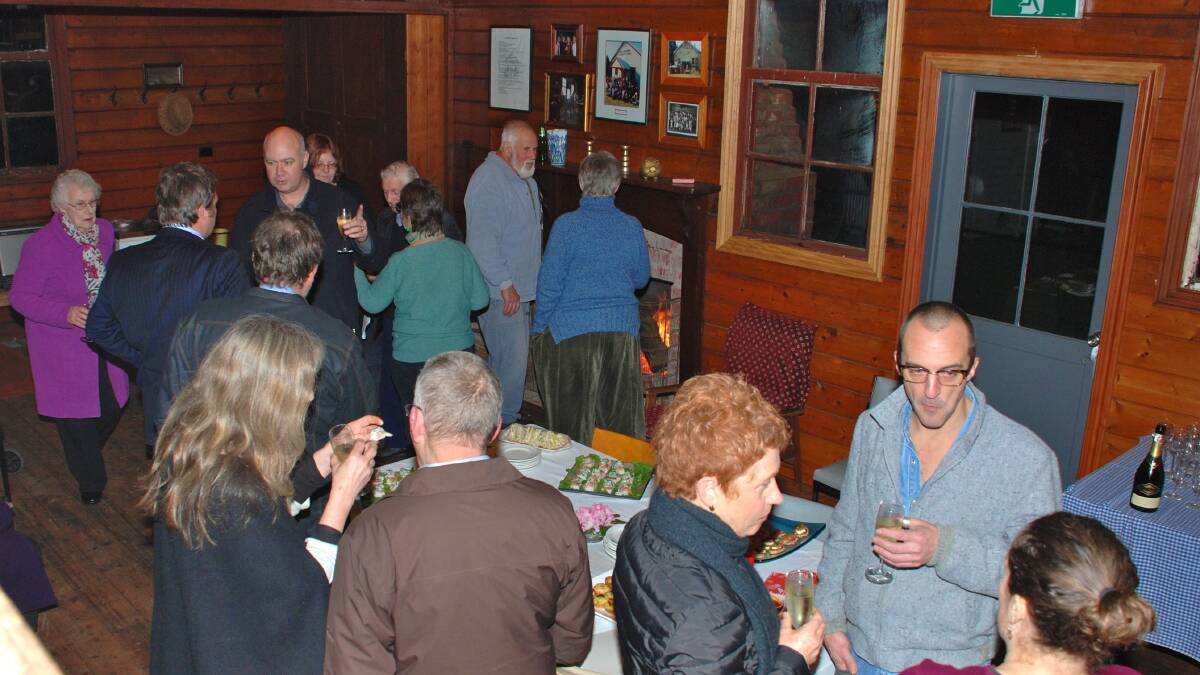 MINGLING: Some of the local community enjoying the night at the recently renovated Mollingghip Hall.