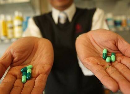 Pfizer has been accused of paying pharmacists to promote its best-selling drugs.