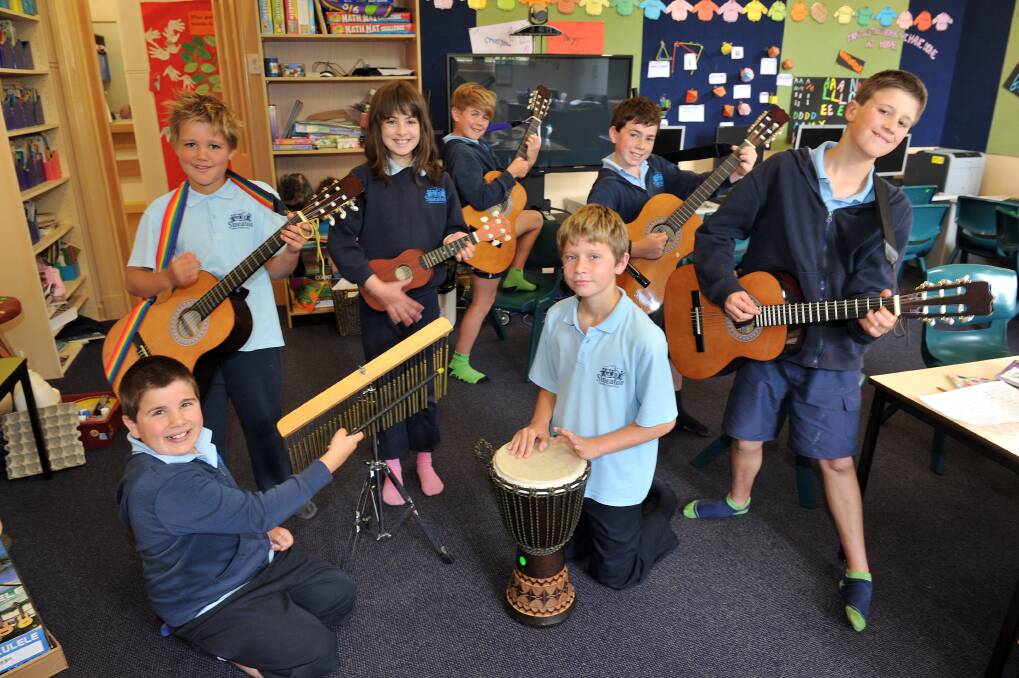 Smeaton primary School pupils jam it up for The Advocate. From left, Sean Gervasoni, Daniel Mizzeni, Aimie Slater, Riley Mizzeni, Joel and Alex Gervasoni, and Alex May at front on drums.  Picture: JULIE HOUGH