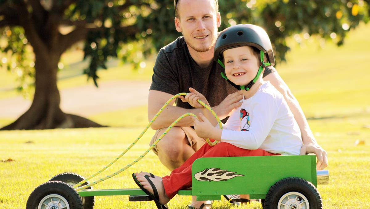 CAPALABA: Adam Woods and son Lockyer, 5, of Capalaba are ready to roll in the Billycart championships on Sunday. Picture: Chris McCormack