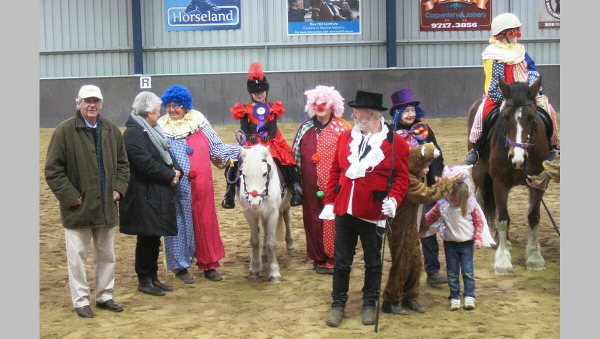 The teams show off their circus-themed fancy dress. They won first prize.
